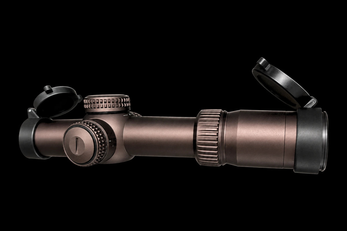 Night Operators RZ 1-10 with its flip up lens covers, one on each end, open, low key light on black